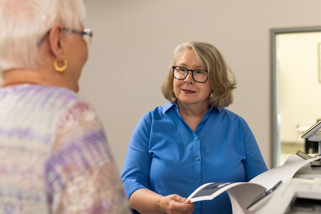 woman explaining materials